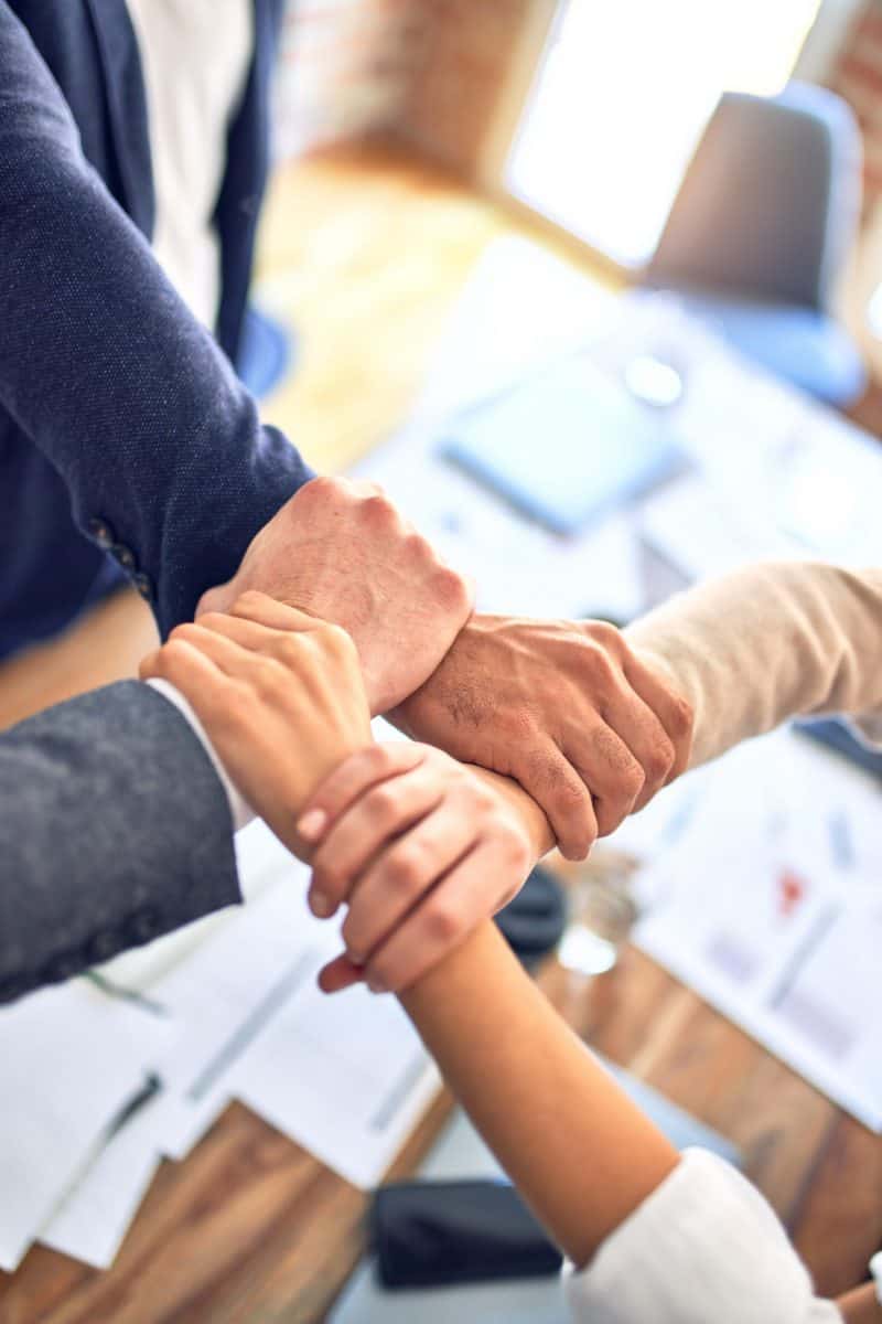 Hands Interlock krakenimages-Y5bvRlcCx8k-unsplash