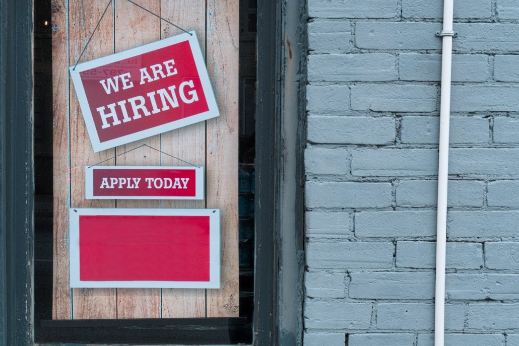 A sign that says we are hiring.